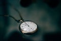 Old vintage pocket watch clock time selective focus abstract dark background Royalty Free Stock Photo
