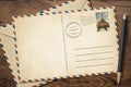 Old vintage postcard and envelope with pen on Royalty Free Stock Photo