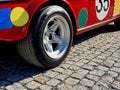 old vintage racing car with additional fog lights. tires of old balloon Royalty Free Stock Photo