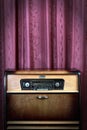 Old vintage radio on red background Royalty Free Stock Photo