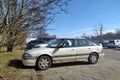 Rare vintage historic old rusty white car sedan Rover 220 GSi 16v parked