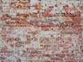 Old vintage red brick wall with sprinkled white plaster texture background Royalty Free Stock Photo