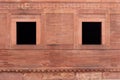 Old vintage red brick wall and two windows at Fatehpur Sikri Pal Royalty Free Stock Photo