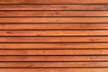 Old vintage red brown wood lath wall cladding for background