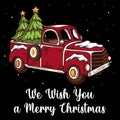 Old vintage red Christmas truck with pine tree Royalty Free Stock Photo