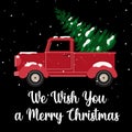 Old vintage red Christmas truck with pine tree Royalty Free Stock Photo