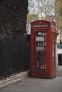 An Old Vintage Red Phone booth on the Millbank Royalty Free Stock Photo