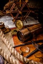 Old vintage retro compass and spyglass on ancient world map Royalty Free Stock Photo
