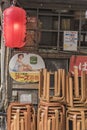 Old vintage retro japanese metal signs and red rice paper lantern where it is written 