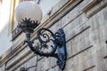 Old vintage retro lamp black classic look on the wall of a house on one of the streets of Lviv Royalty Free Stock Photo