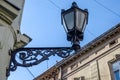 Old vintage retro lamp black classic look on the wall of a house on one of the streets of Lviv Royalty Free Stock Photo