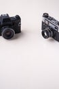 Old vintage retro single black photo film camera copy space angle view on white background Royalty Free Stock Photo