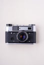 Old vintage retro single silver photo film camera copy space top view flat lay on white background