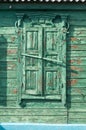 Old vintage retro wooden turquoise cracked paint window blinds, as historic architecture background Royalty Free Stock Photo