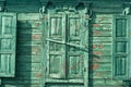 Old vintage retro wooden turquoise cracked paint window blinds, as historic architecture background Royalty Free Stock Photo