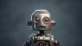 Old vintage robot toy of grey metal color and scared with blue eyes Royalty Free Stock Photo