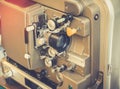 Old vintage rolling film cinema projector with copy space for background. Royalty Free Stock Photo