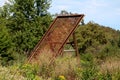 Old vintage rusted gravel sand sieve screen mesh held together with strong metal frame left at abandoned construction site Royalty Free Stock Photo