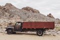 Old vintage rusty car truck abandoned in the desert Royalty Free Stock Photo