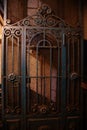 Old vintage rusty elevator gates in old mansion