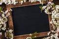 Old vintage school slate with flowers Royalty Free Stock Photo