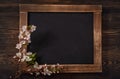 Old vintage school slate with flowers Royalty Free Stock Photo