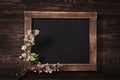 Old vintage school slate with flowers Royalty Free Stock Photo