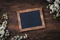 Old vintage school slate with flowers Royalty Free Stock Photo