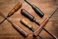 Old vintage screwdrivers and files of the last century extracted from the chest in the workshop of grandfather. Background for Royalty Free Stock Photo