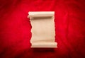 Old vintage scroll on red background Royalty Free Stock Photo