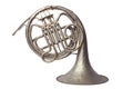 Old vintage silver French horn on a on white background Royalty Free Stock Photo