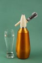 Old vintage siphon and glass of water Royalty Free Stock Photo