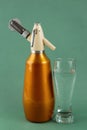 Old vintage siphon and glass of water Royalty Free Stock Photo