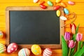 Old vintage slate with colorful Easter eggs Royalty Free Stock Photo