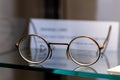 Old vintage spectacle glasses on display in a museum in Aldershot, UK Royalty Free Stock Photo