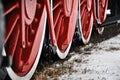 Old vintage steam train, locomotive, train with red wheels, old carriages, close-up to the wheels Royalty Free Stock Photo