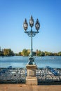 Old vintage street lamp on the lake of Enghien les Bains near Paris France Royalty Free Stock Photo