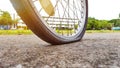 An old vintage style bicycle that has its back flat tire Royalty Free Stock Photo