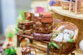 Old vintage suitcases lie on a street bench. Miniature toy composition Royalty Free Stock Photo