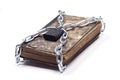 Old vintage tattered book lock with chain white background
