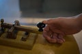 The old and vintage telegraph key and operator's hand , Morse sy Royalty Free Stock Photo