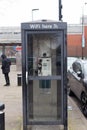 Old vintage telephone booth with wifi