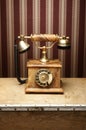 An old vintage telephone on a wooden table Royalty Free Stock Photo