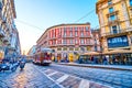 The old vintage tram rides along Via Dante street in central district of Milan, Italy Royalty Free Stock Photo