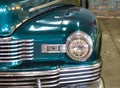 Old vintage turquoise car headlight Royalty Free Stock Photo