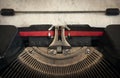 Old vintage typewriter with paper sheet. Space for your text. Re Royalty Free Stock Photo