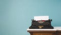 Old vintage typewriter on a table over an isolated background. Royalty Free Stock Photo