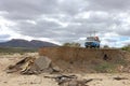 Old vintage van on damaged and washed out road in Baja California, Mexico