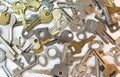 Old vintage various keys pattern. Antique metal gold bronze silver color different clue for padlock. Chaotically mix