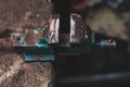 Old vintage vise screwed to a table in a garage Royalty Free Stock Photo